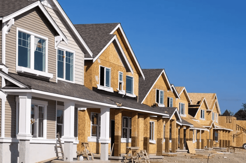 A row of houses mid-construction.